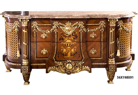 A French Louis XVI style ormolu-mounted veneer inlaid parquetry and marquetry Bahut on the manner of Jean-Henri Riesener model, 19th century